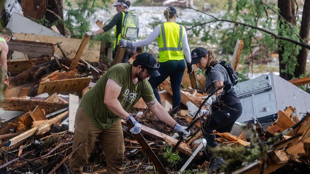 At least 21 children among dozens killed in Texas floods, as 11 girls from camp still missing