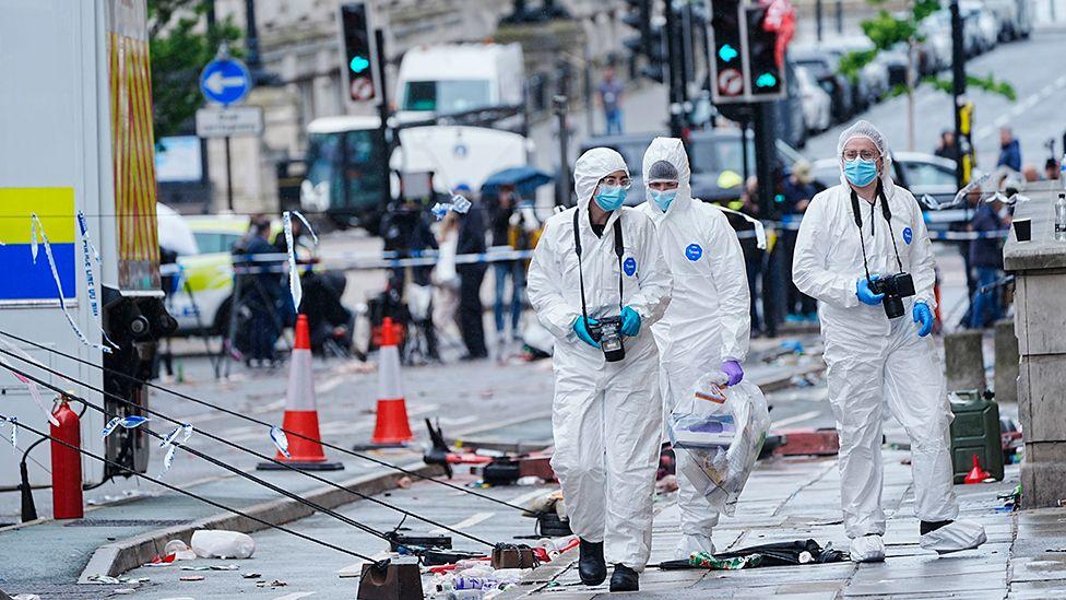 Man arrested over attempted murder as 11 still in hospital after Liverpool crash, police say